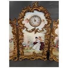 Austrian enamel three section screen clock courting scenes. For Sale at Ruby Lane