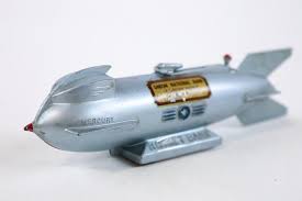 Sold at Auction: Vintage Mechanical Mercury Rocket Bank
