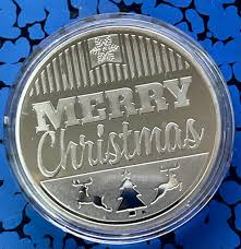 Christmas-themed Collectible Coin Featuring Santa Riding a ...