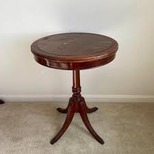 Duncan Phyfe Round Leather Top Side Table | EstateSales.org