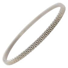 Tiffany and Co. Somerset Mesh Rigid Bangle Bracelet 18 Karat White Gold Narrow at 1stDibs | tiffany & co somerset mesh bracelet, tiffany somerset bangle, tiffany mesh bangles