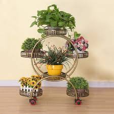 Amazon.com: XGGYO Soporte para plantas con ruedas, estante de metal para macetas, para uso en interiores y exteriores, soporte de exhibición de plantas, D, 6 paletas : Patio, Césped y Jardín