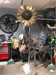 sunflower sculpture 6.5' feet tall steel stainless steel and brass.