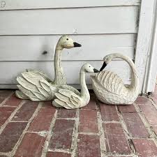 P632 Lot of Three Wooden Swans | EstateSales.org