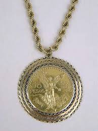 Lot - A MEXICAN 50 PESOS 37.5 ORO PURO 1801-1947 GOLD COIN ...