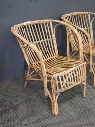 Sold at Auction: PAIR OF VINTAGE CANE PATIO CHAIRS