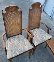 Dark wood dining table with 6 wicker/cane/ rattan high back ...