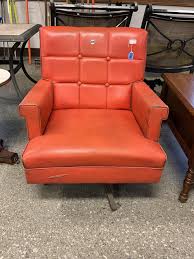 Sold at Auction: Mid-Century Orange Vinyl Chair