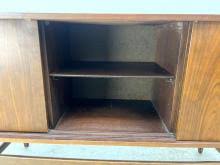Sold at Auction: AMERICAN MODERN WALNUT SLIDING DOOR CREDENZA SIDEBOARD. STYLISH PULLS.