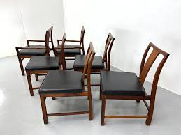 Sold at Auction: SET 6 ASIAN INSPIRED CENTRAL SLAT BACK DINING CHAIRS. TWO ARM AND FOUR SIDE CHAIRS. HIBRITEN LABEL.