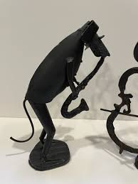 Two Welded Metal Dog Sculptures Playing Musical Instruments ...
