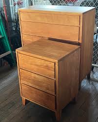 1950's Conant Ball Modern Dressers. Solid Maple construction by Leslie Diamond. Part of the “Modern Mates” collection. Lightly refinished these still have a nice patina and retain that vintage glow. Tall dresser