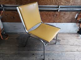 Vinyl Reception Chair in Black or Yellow I Film rental only — Anizco
