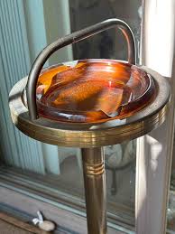 Sold at Auction: Vintage Brass Tone Orange Glass Standing ...