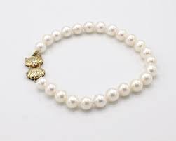 Blue Lagoon by Mikimoto Cultured Pearl and Diamond 14 Karat Yellow Gold Bracelet at 1stDibs | mikimoto blue lagoon, blue lagoon mikimoto, blue lagoon pearls