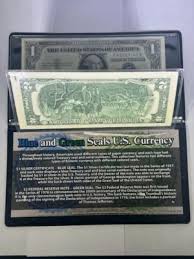 FIRST COMMEMORATIVE MINT $1 BLUE AND $2 GREEN ...