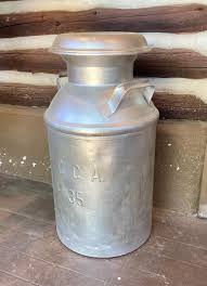 LOT 56: Vintage Hershey Farms Metal Milk Can | EstateSales.org