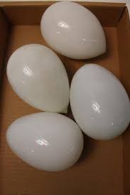 Sold at Auction: LOT OF 4 HAND BLOWN MILK GLASS EGGS