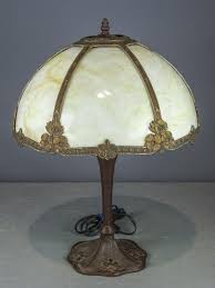 Sold at Auction: Repro Slag Glass Lamp
