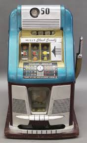 Sold at Auction: Mills Antique 50-cent /Half Dollar Slot Machine: NO SHIPPING – RARE fifty-center; marked at front 'Mills Black Beauty'; all original surface, tags (had operating here/paid out – DO NOT