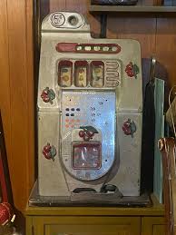 What is the value of a post-war Black Cherry Mills slot ...
