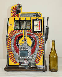 Sold at Auction: Antique Mills War Eagle 10 cent slot machine