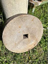 Antique sharpening stone wheel.