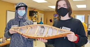 Midland-area Indigenous students taught birch bark canoe building from master