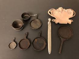 Martin Stove Cast Iron skillet ashtray. Front and back are ...