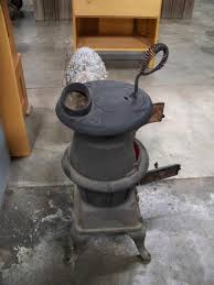 Sold at Auction: Small Cast Iron Pot Bellied Stove