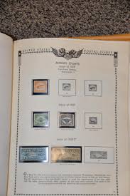 Sold at Auction: The All American Stamp Album published by Minkus Publications, Inc., many pages filled with stamps