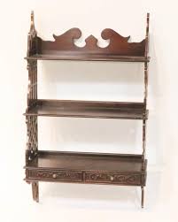Sold at Auction: Chippendale-Style Mahogany Wall Shelf