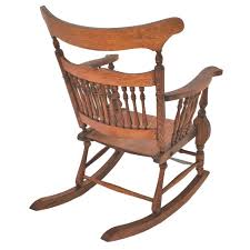 Antique 1910s Tiger Oak Rocking Chair – Curved Back, Spindles, Pressed Carving | Chairish