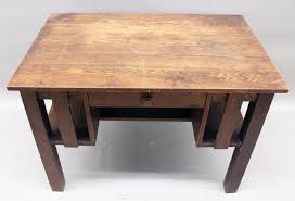 Sold at Auction: RHE -Furniture: Antique Mission Oak desk/writing table – one-drawer oak desk with open bookcases @each side; stretcher base; unmarked; old natural finish; 42” W X 26 ¼” Dia. X