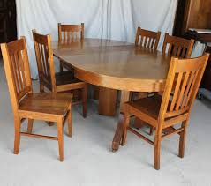 Bargain John's Antiques | Antique Mission style Round Oak Table with 4 leaves - Bargain John's Antiques