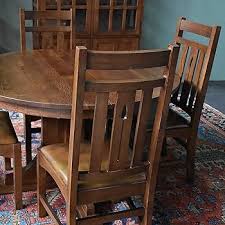 Amazon.com - Crafters and Weavers Solid Oak Round Dining Table with 2 Leaves - Tables