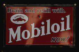 Mobil Oil signs Tote Bag by Flees Photos - Flees Photos