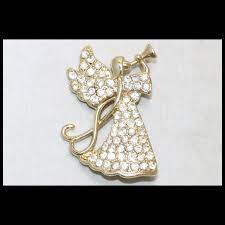 Vintage Monet Gold Tone Angel With A Horn Brooch. For Sale ...