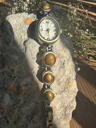 Vintage Woman's Avon Watch With Mother Of Pearl Face And ...