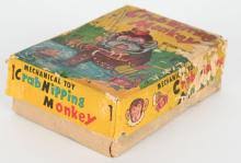 Sold at Auction: JAPAN TIN WINDUP CRAB NIPPING MONKEY w/ BOX