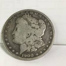 Sold at Auction: 1900 O Morgan Silver Dollar