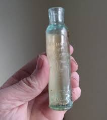 OMEGA OIL ITS GREEN EMB TREE EARLY 1900 LUMBAGO MEDICINE ...