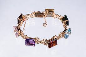 Sold at Auction: 14K GOLD AND MULTI-GEMSTONE BRACELET