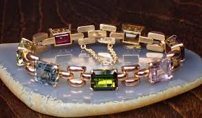 Sold at Auction: MULTI COLOR GEMSTONE AND ROSE GOLD BRACELET