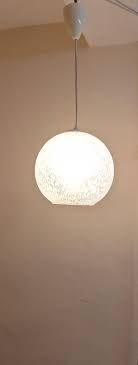 Vintage Ceiling Lamp with Patterned Spherical Shade on a ...