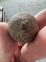 Hope this post is ok. I randomly found this and was wondering if it might be a musket ball? Weighs about 434 grains and about an inch long. Also has a flat