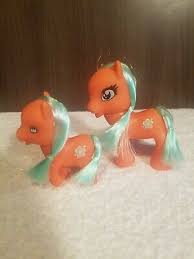2 Sets Of Colored Ponies Mint & Orange 1 Large & 1 Small Of ...