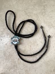 Vintage Native American, sterling, silver Zuni, sun face bolo tie
