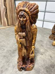 Hand Carved Cedar Wood Indian Holding a Stick | The Forest Store