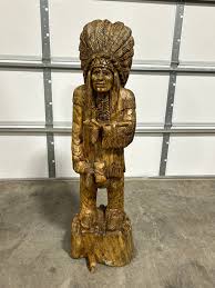 Hand Carved Cedar Wood Indian Holding a Stick | The Forest Store